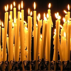 Видеть во сне много церковных свечей
