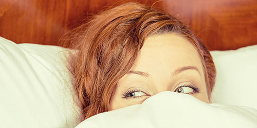 к чему снится обнаженная женщина в постели